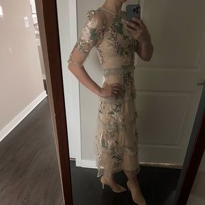 Darling beige dress with beautiful embroidered detail